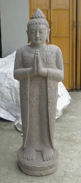 Product image of the product “Standing Buddha with floral carving, Greeting position. 40 x 29 x 120cm. Natural stone (river stone), stonemasonry ”